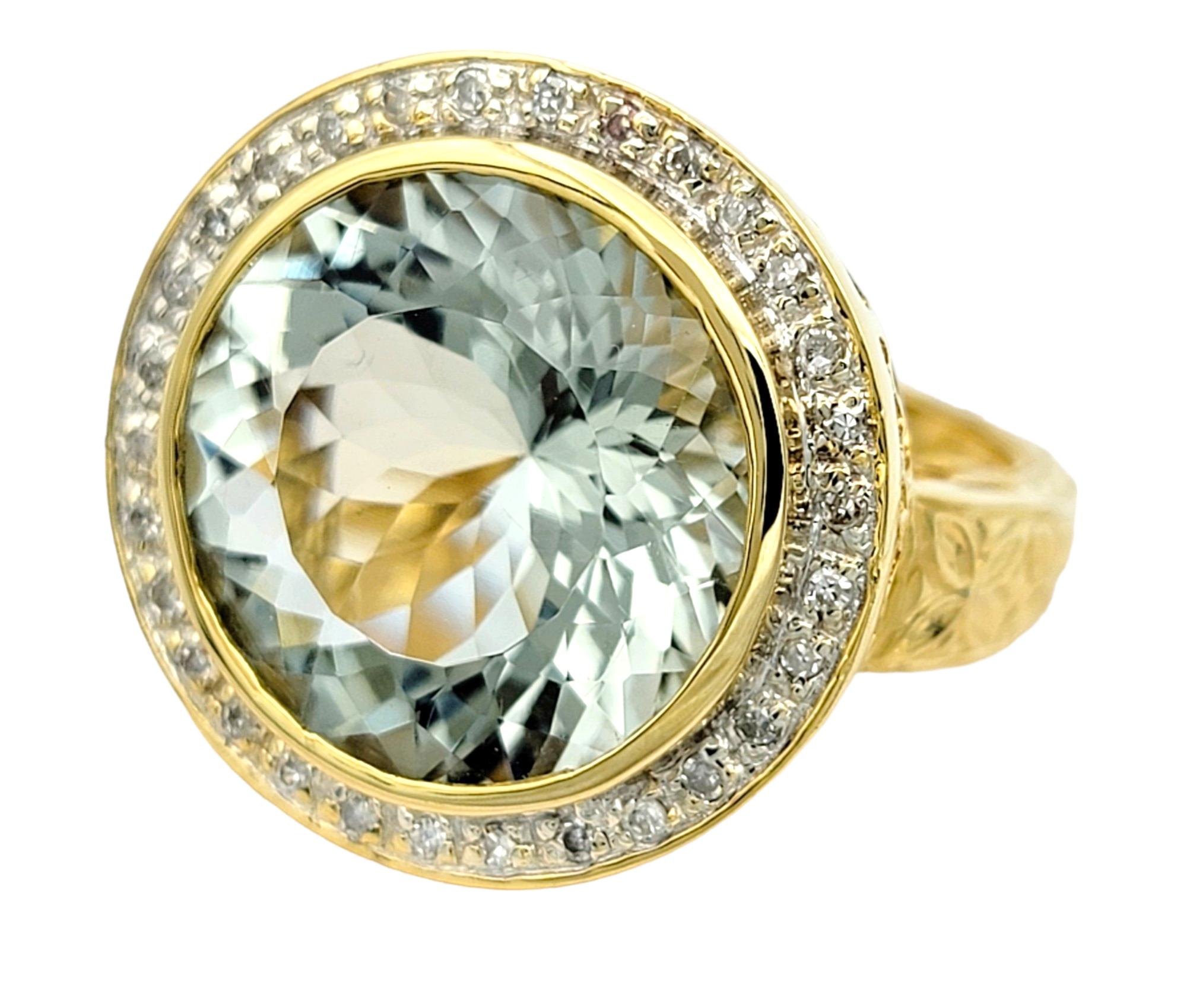 Ring Size: 5

Radiating with a mesmerizing hue that blends the serene tones of green and blue, the round prasiolite gemstone takes center stage in this exquisite ring. Set in elegant 14 karat white gold, the prasiolite is adorned with a halo of