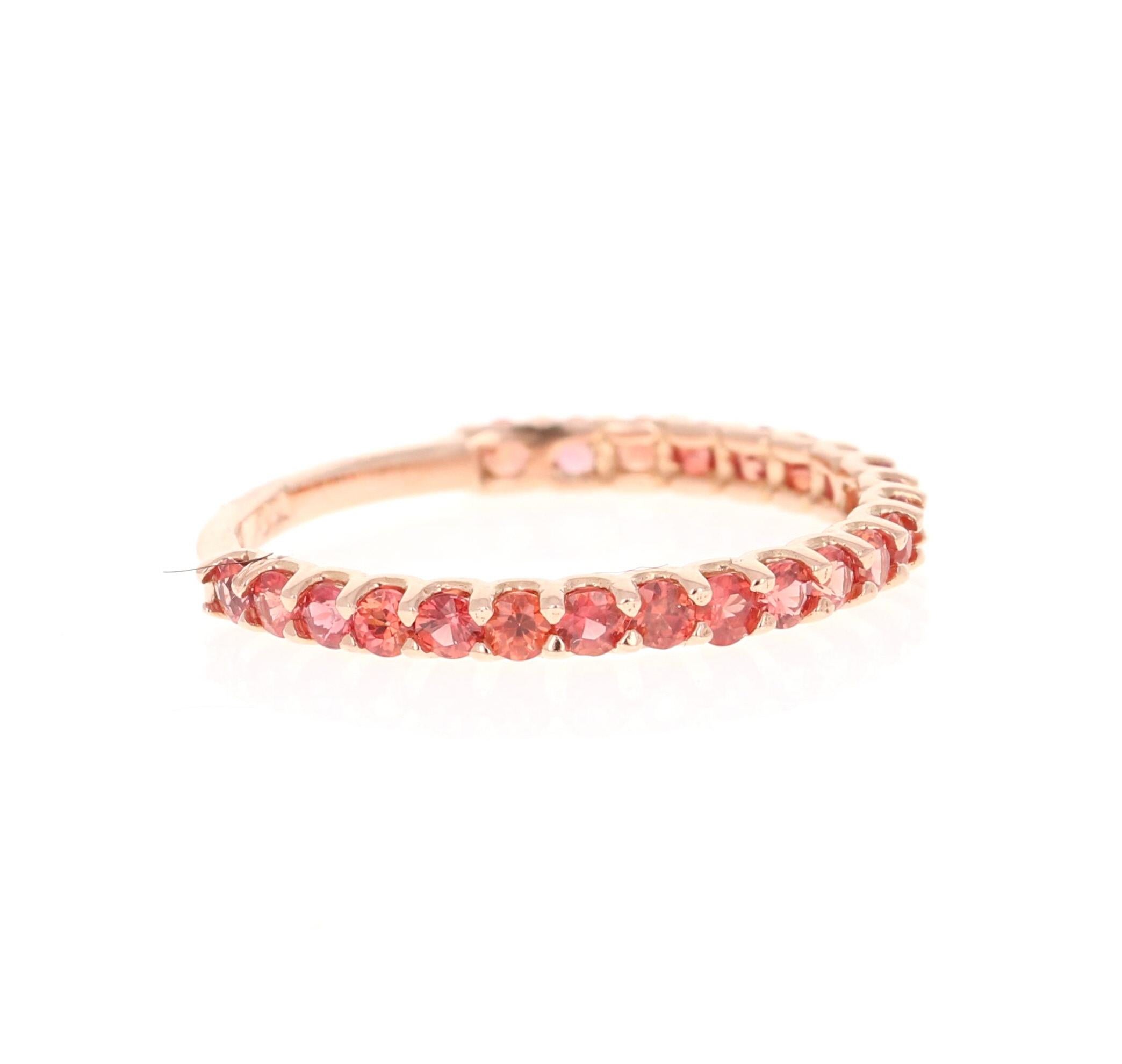 This ring has 23 Natural Round Cut Red Sapphires that weigh 0.85 Carats. 

Crafted in 14 Karat Rose Gold and weighs approximately 1.3 grams 

The ring is a size 7 and can be re-sized at no additional charge!

We have this same ring in White Gold as