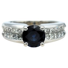 Round Cut Sapphire and Princess Cut Diamond Band Ring in 18 Karat White Gold