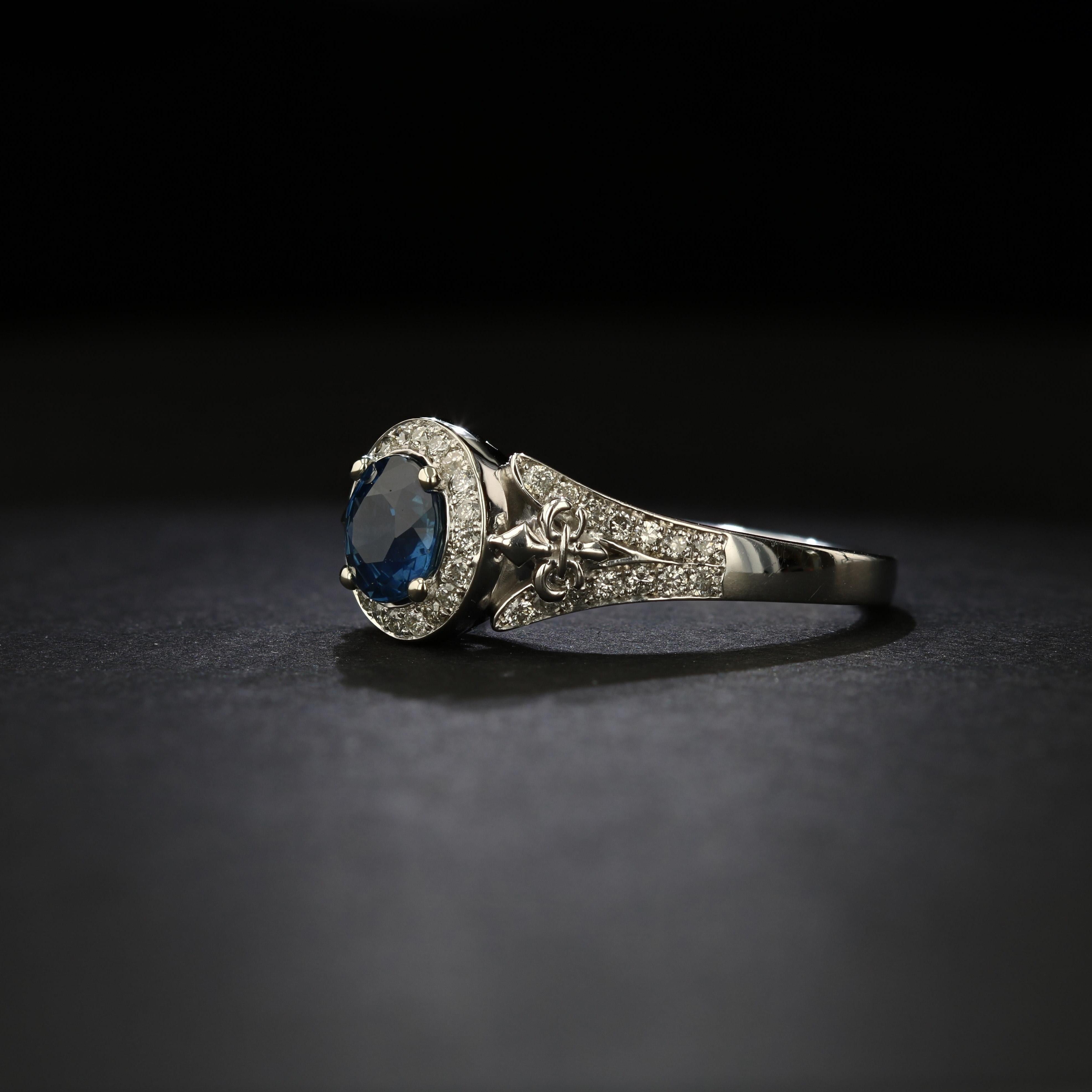 Women's Round-Cut Sapphire Ring with Diamond Halo and Details