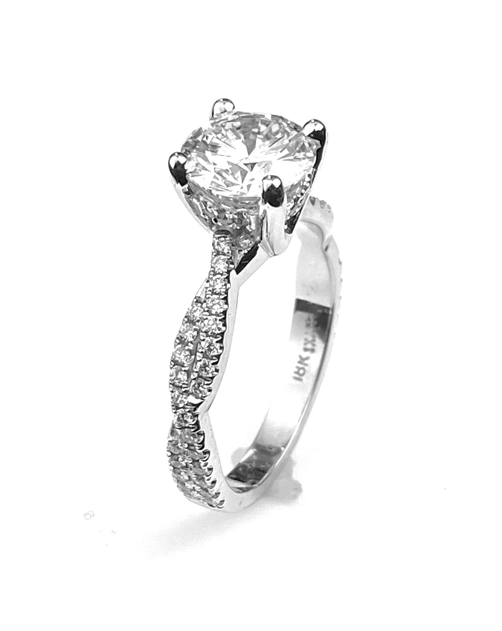 Women's Round Cut Solitaire Diamond Engagement Ring with Twist Design Setting For Sale