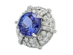 Round Cut Tanzanite and Double Diamond Halo Stud Earrings in 18 Karat White Gold