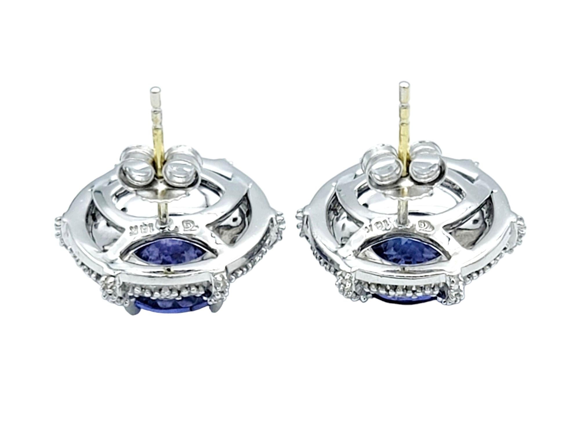 Women's Round Cut Tanzanite and Double Diamond Halo Stud Earrings in 18 Karat White Gold For Sale