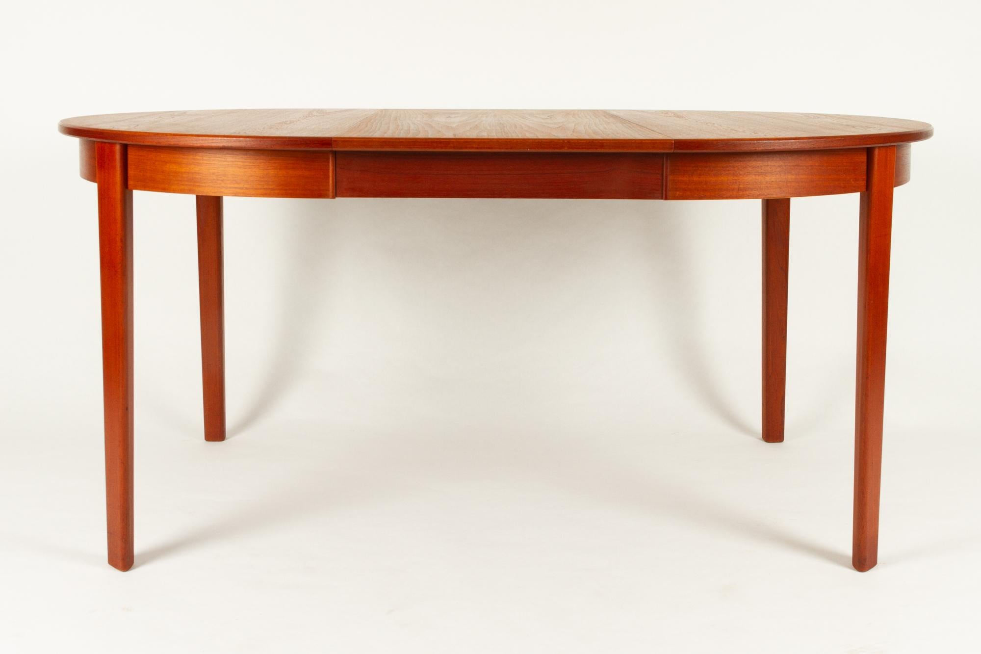 Round Danish extendable teak dining table, 1960s
Midcentury modern teak dining table with two extension leaves. Many lovely details, very good craftsmanship.
Measures: Diameter 110 cm. Length with one leaf 160 cm. With both leaves 210cm.
Very