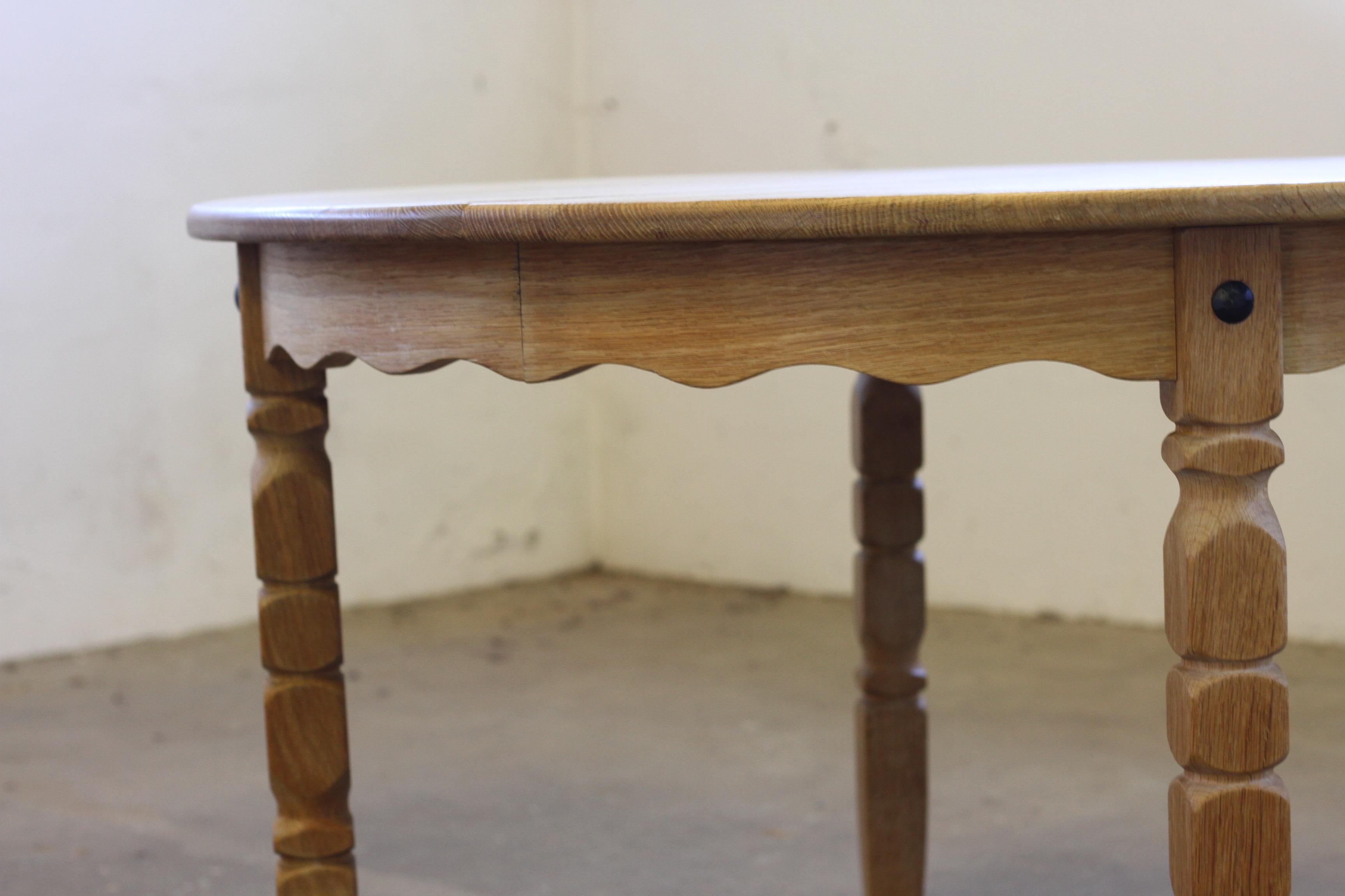 Mid-20th Century Round Danish Extending Dining Table in Light Oak, Henning Kjærnulf, 1960s For Sale