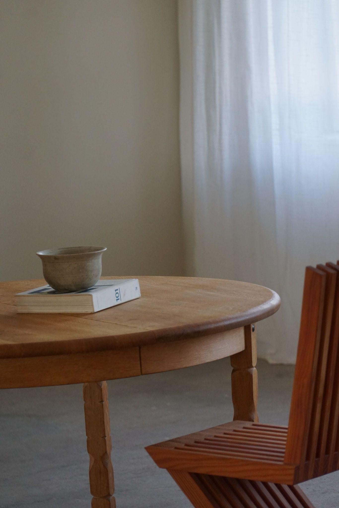 Round Danish Mid Century Dining Table in Solid Oak with Two Extensions, 1960s 13