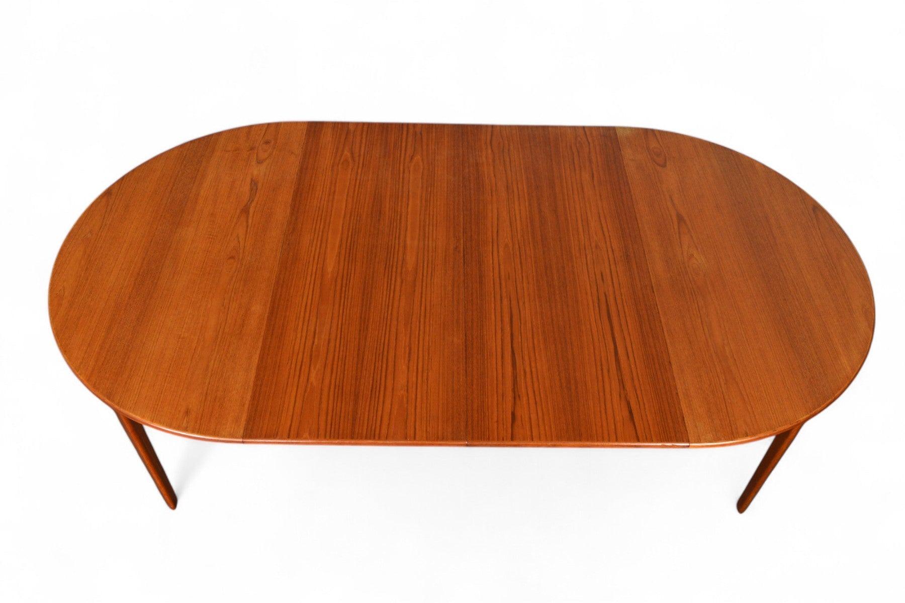 Round Danish Modern Expandable Teak Dining Table With Two Leaves For Sale 5