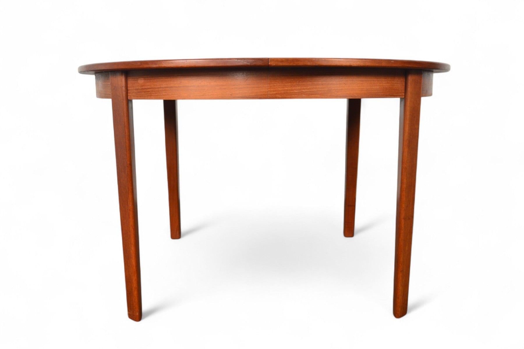 Mid-Century Modern Round Danish Modern Expandable Teak Dining Table With Two Leaves For Sale