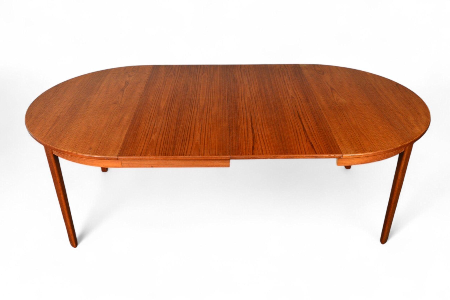 Round Danish Modern Expandable Teak Dining Table With Two Leaves For Sale 3