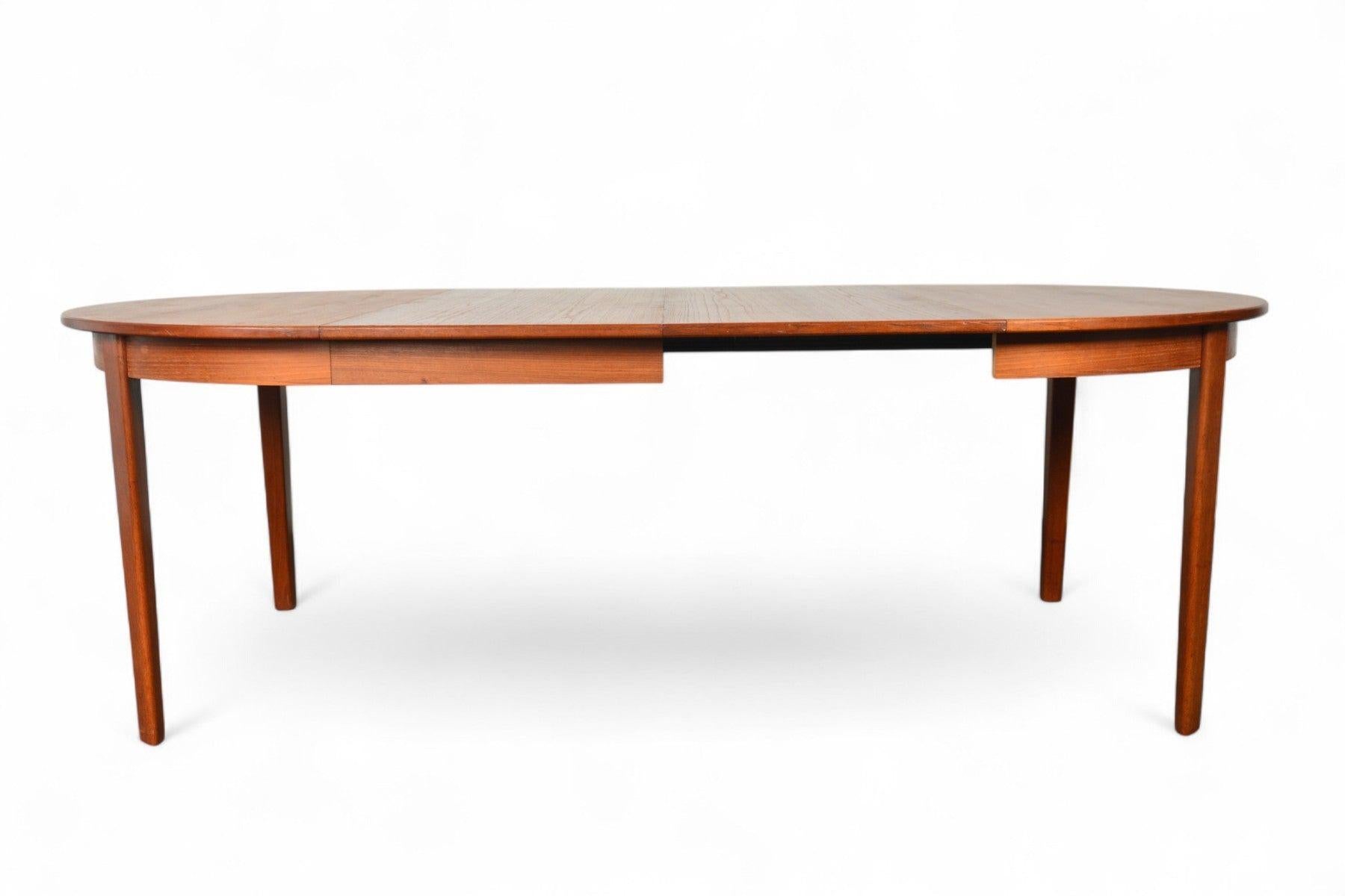 Round Danish Modern Expandable Teak Dining Table With Two Leaves For Sale 4