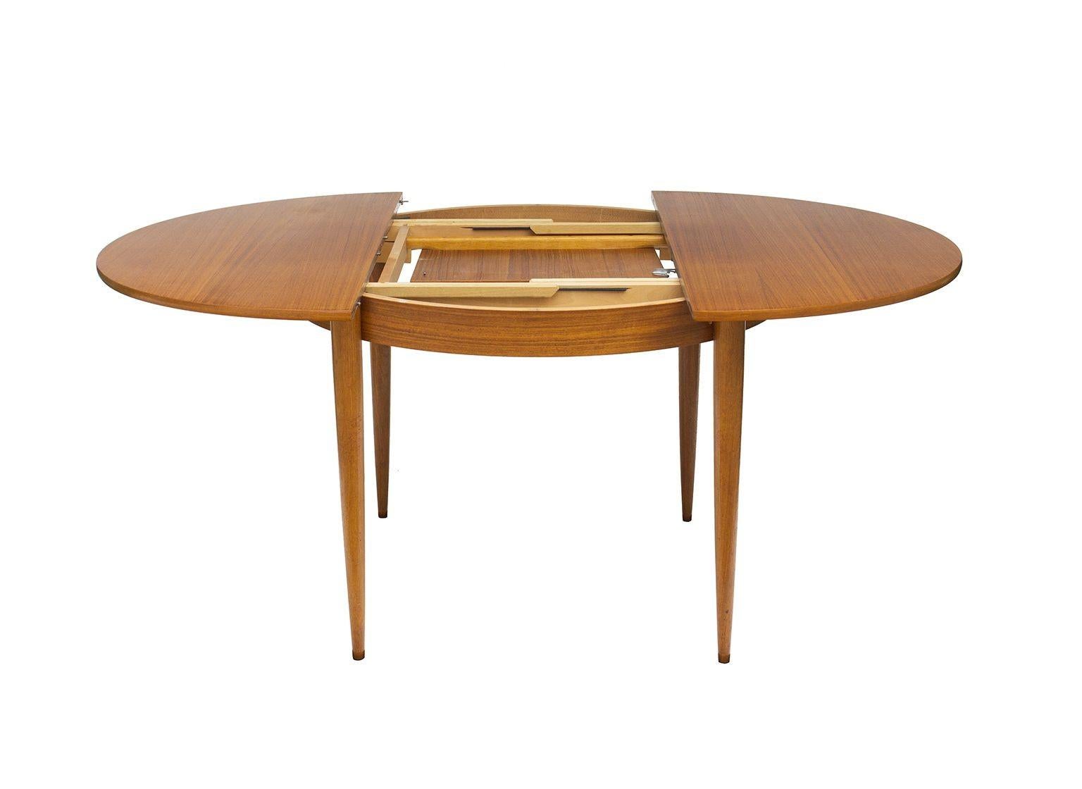 Danish Round Scandinavian Teak Dining Table with Butterfly Leaf