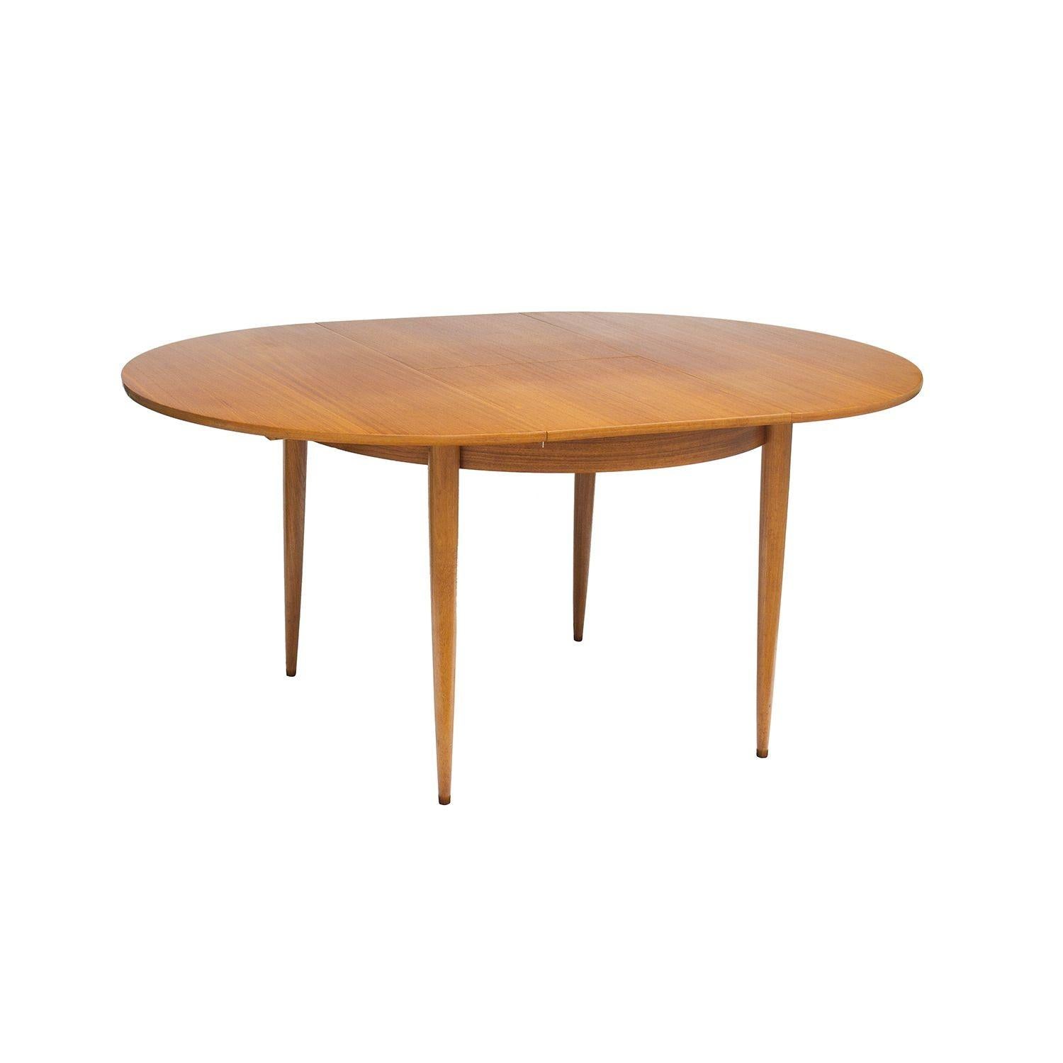 Round Scandinavian Teak Dining Table with Butterfly Leaf In Good Condition In Grand Rapids, MI