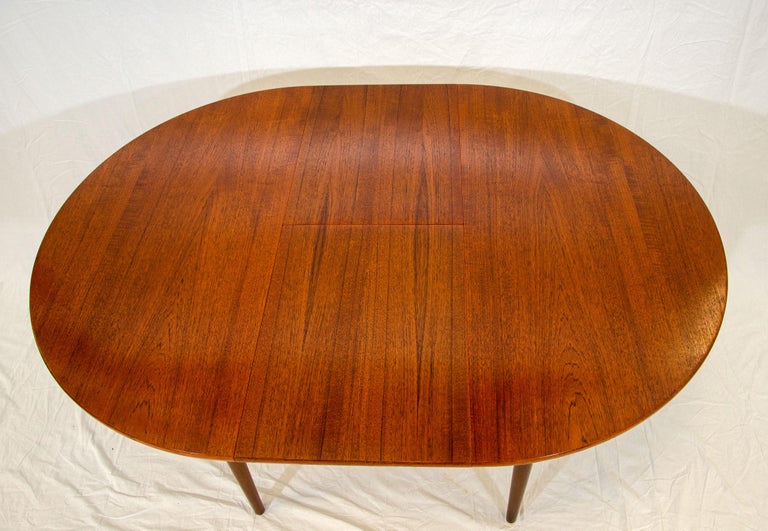 Round Danish Teak Dining Table with Butterfly Leaf For Sale 1