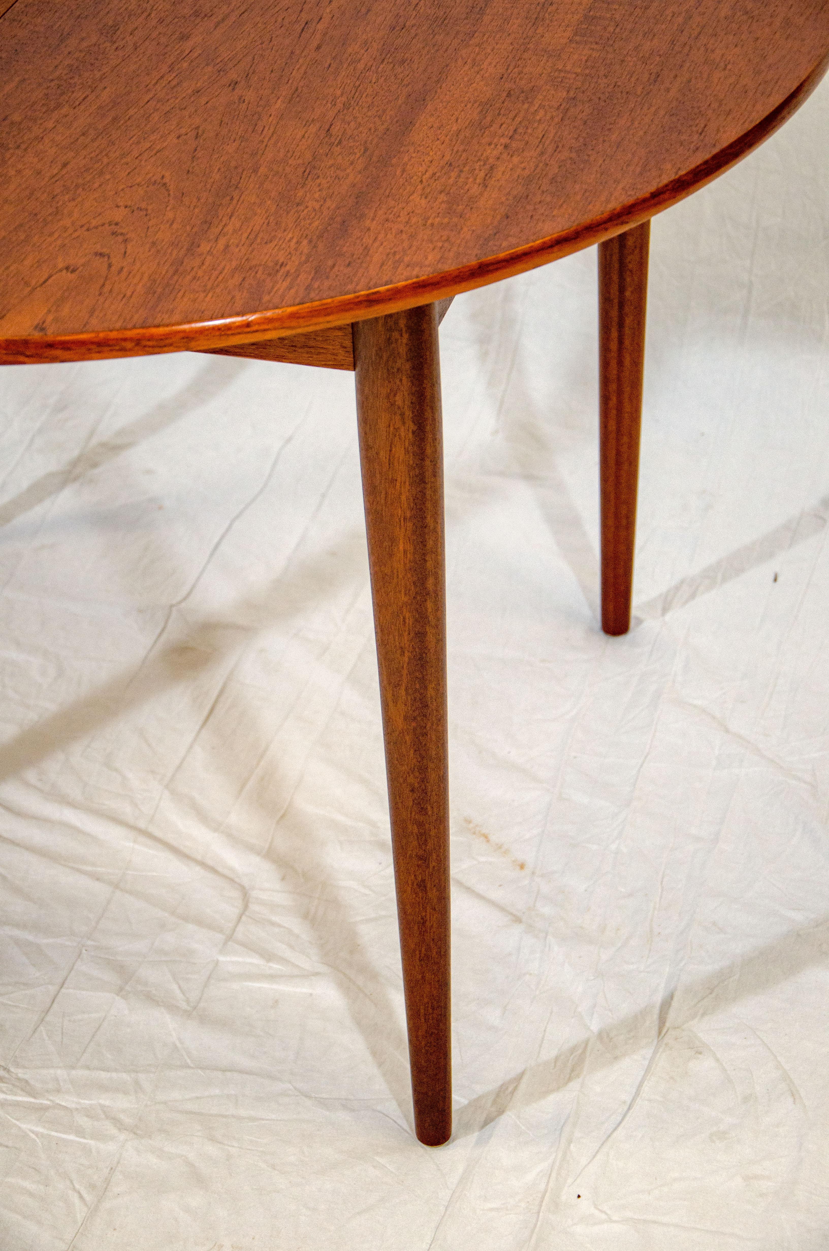 Round Danish Teak Dining Table with Butterfly Leaf In Good Condition For Sale In Crockett, CA