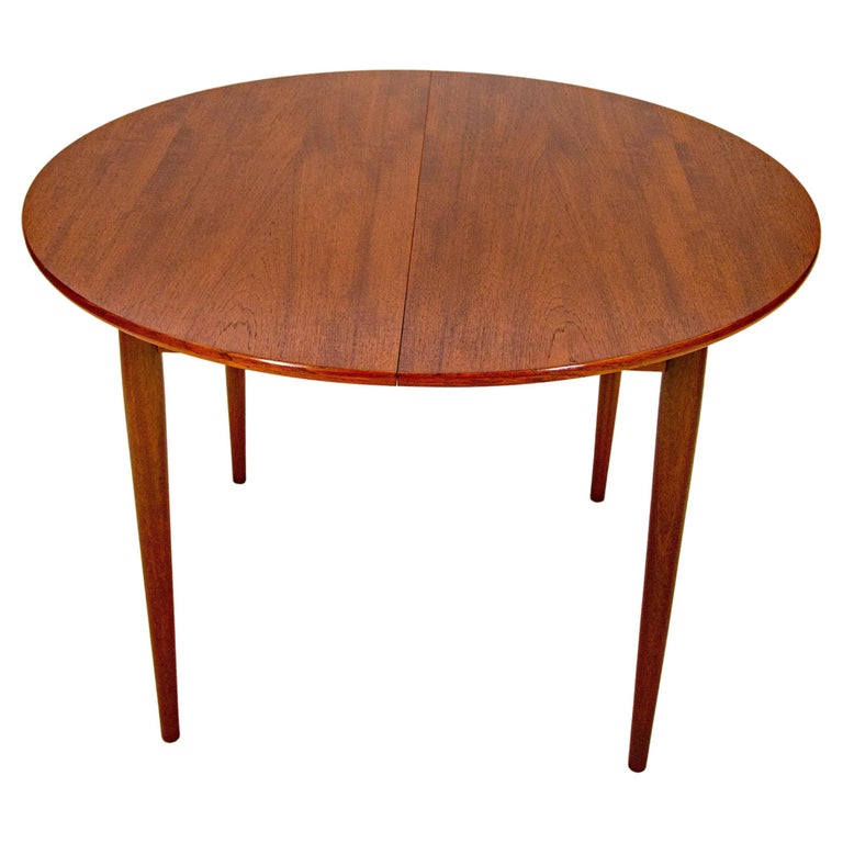 Round Danish Teak Dining Table with Butterfly Leaf For Sale