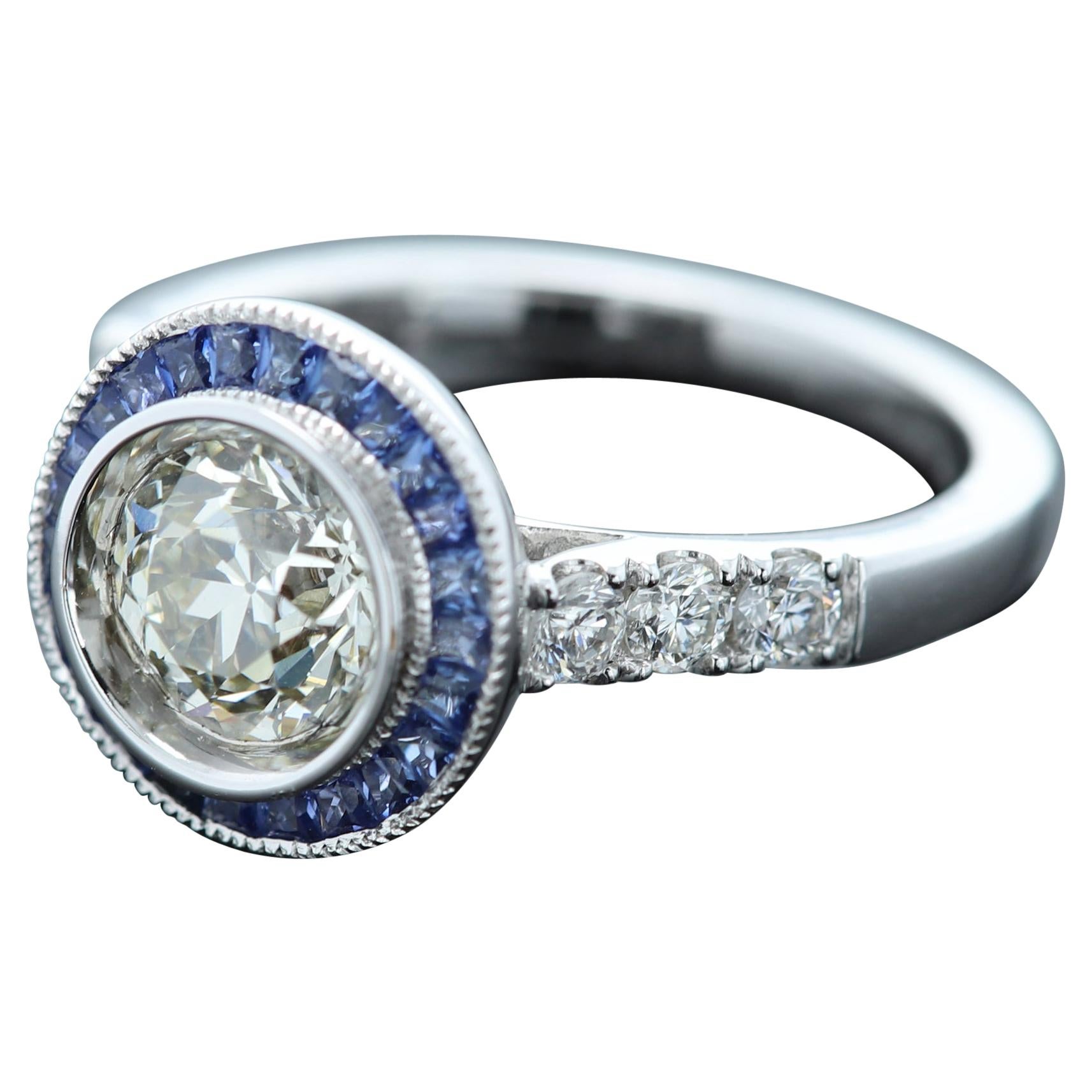 Bague en or blanc 18 carats de style Art déco avec diamant rond de 1,25 carat et saphir bleu