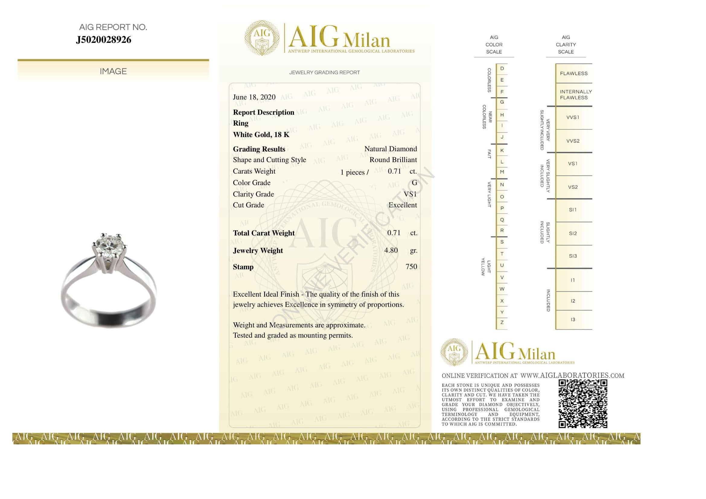 Stunning and breathtaking engagement solitaire diamond ring. 18 karat white gold wedding jewel with a round precious stone sustained by white gold in a hexagon shape.  AIG Certified (The Color, The Clarity, The Cut and The Carat weight).
 
This