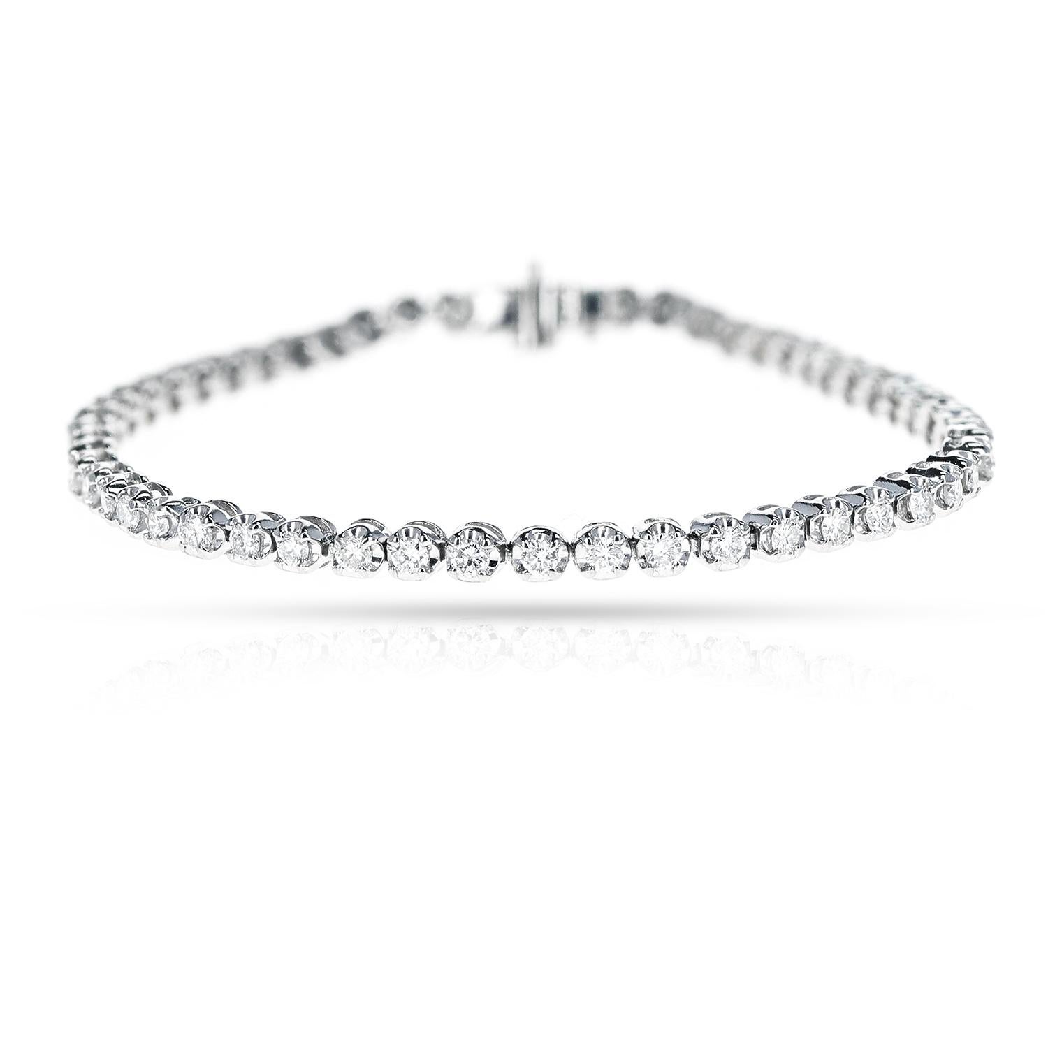 A Round Diamond 2 ctw. Tennis Bracelet made in Platinum. The length is 7 inches. The total weight of the bracelet is 12.25 grams. 