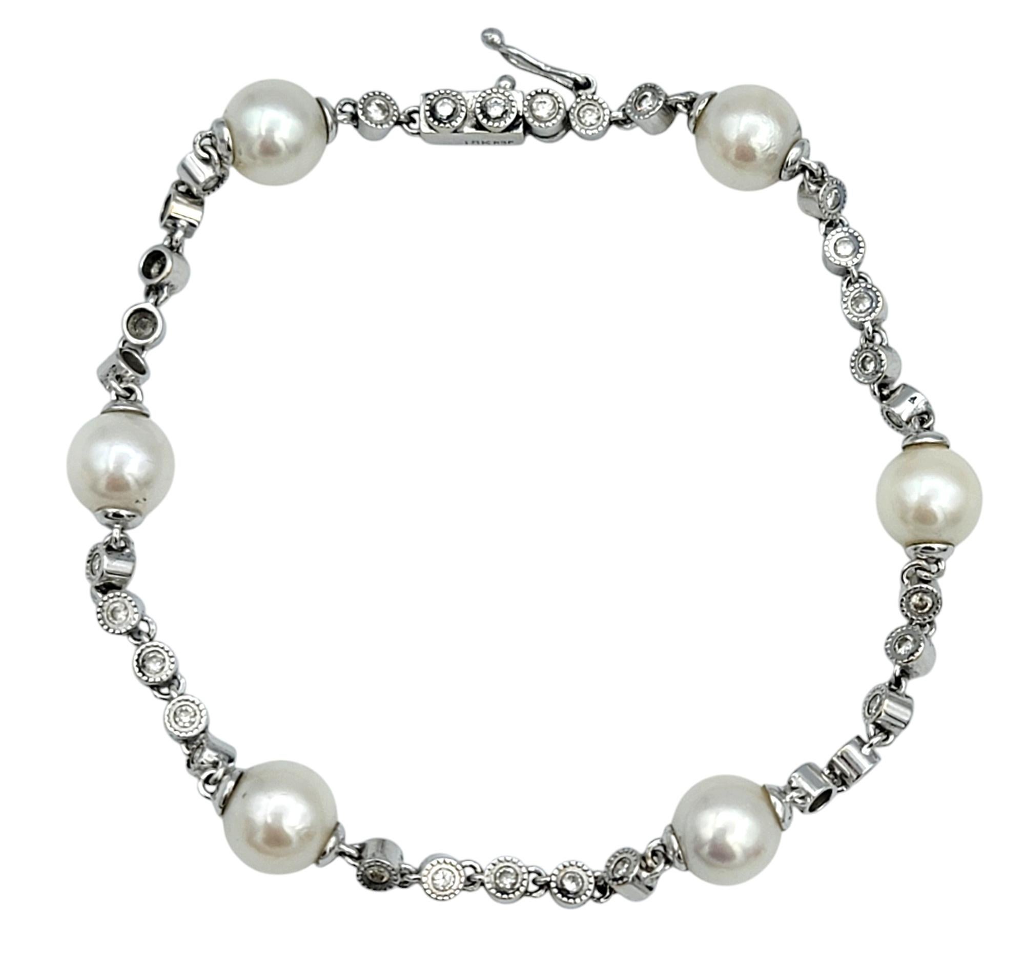 Elevate your fine jewelry collection with this stunning Akoya pearl and diamond station bracelet, exquisitely crafted in 18 karat white gold. A timeless design, this bracelet features a delicate arrangement of lustrous white cultured Akoya pearls,