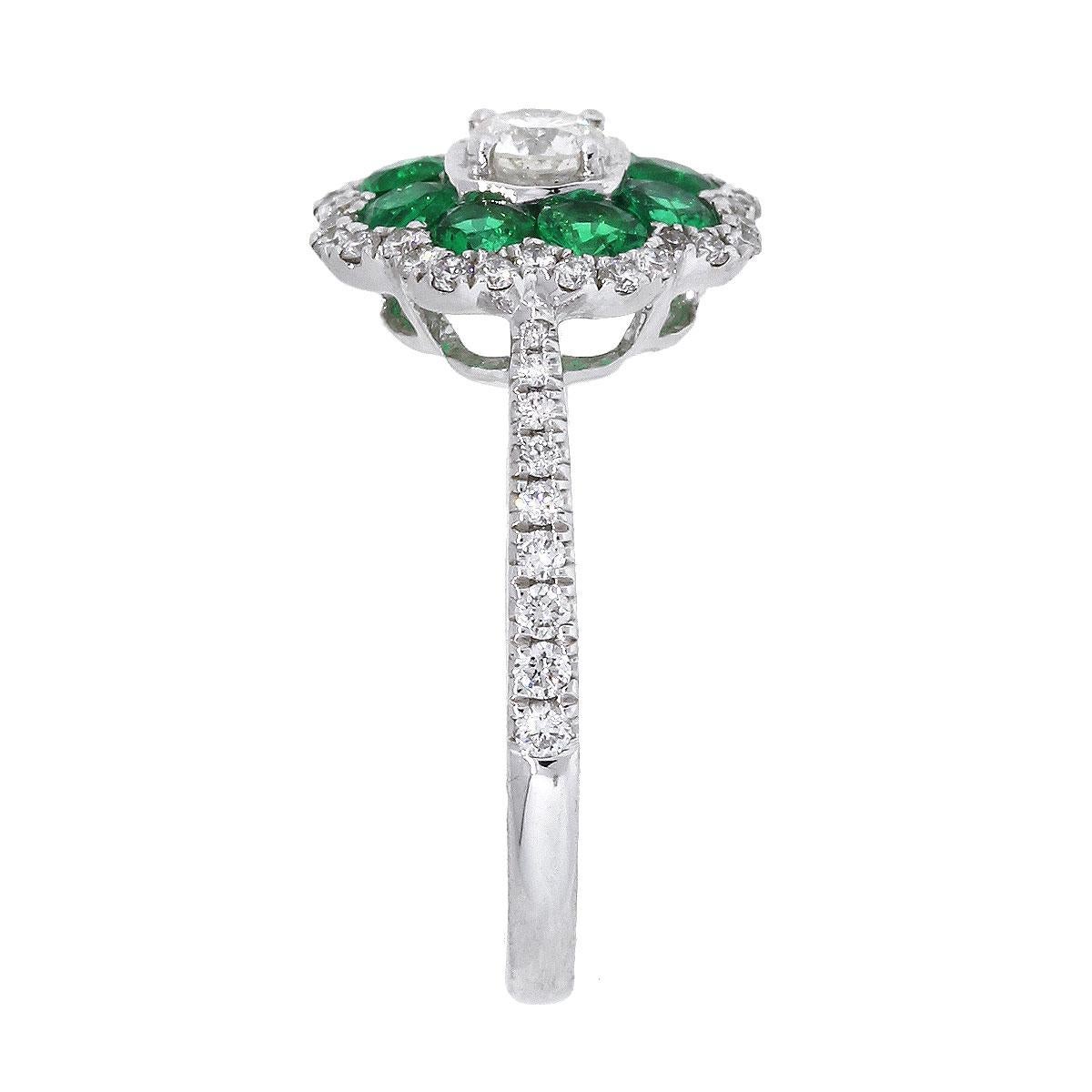Material: 18k White Gold
Round Diamond Details: Approximately 0.54ctw of round brilliant diamonds. Diamonds are G/H in color and VS in clarity
Emerald Details: Approximately 0.59ctw of round cut Emerald gemstones.
Size: 6.25
Total Weight: 3.8g
