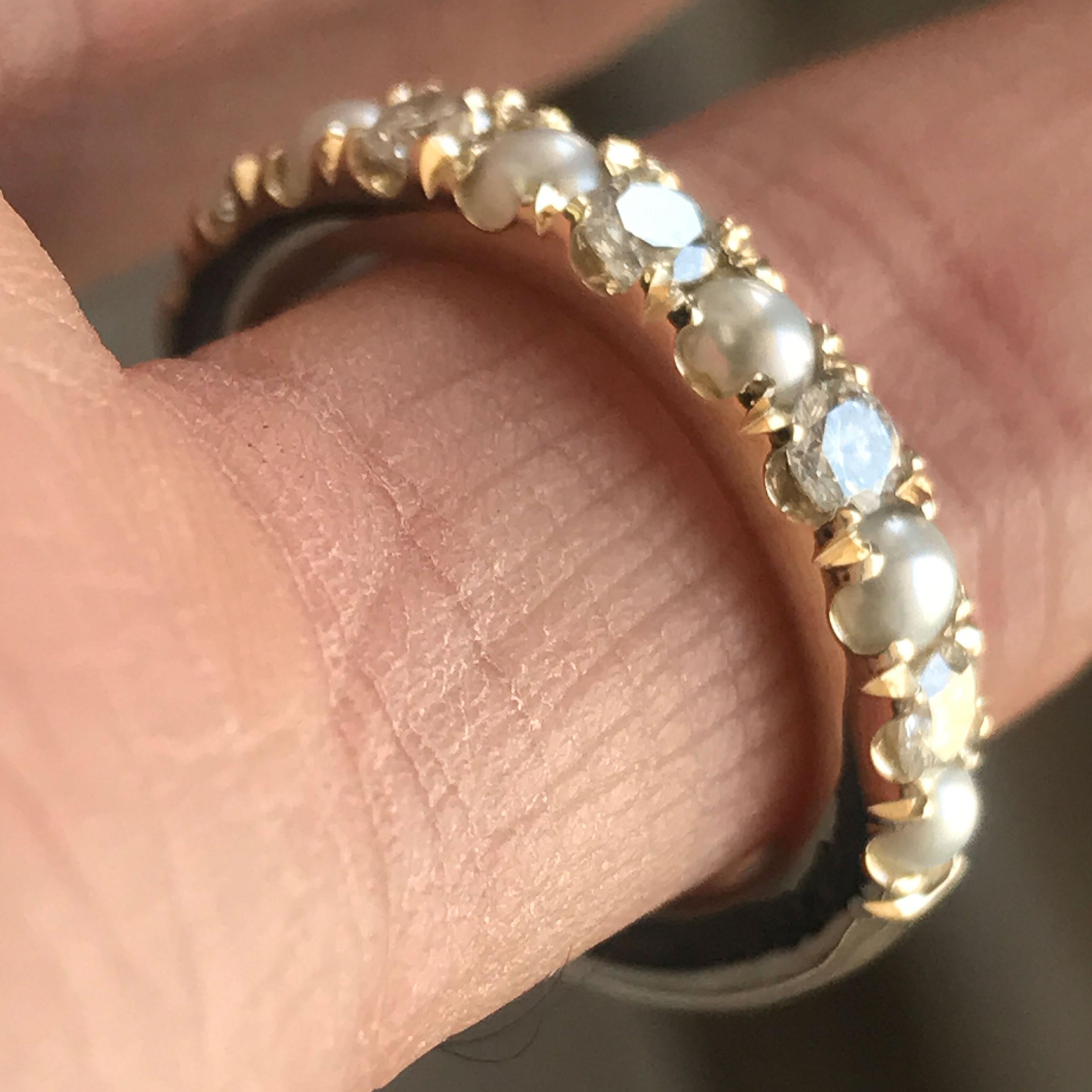 Made to order, please allow 2-5 weeks.
 
Round Set Diamond Wedding / Eternity Band 0.60 CTW F-H Color VS - SI Clarity

4 Perfectly Set Diamonds 3.0 mm each, 3 Half Pearl 3.00 mm each
White natural diamonds no treatment (F-H Color VS-SI