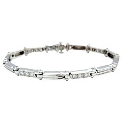 Rundes Diamant- und geriffeltes Gliederarmband aus 14 Karat Weißgold, E-F / VS