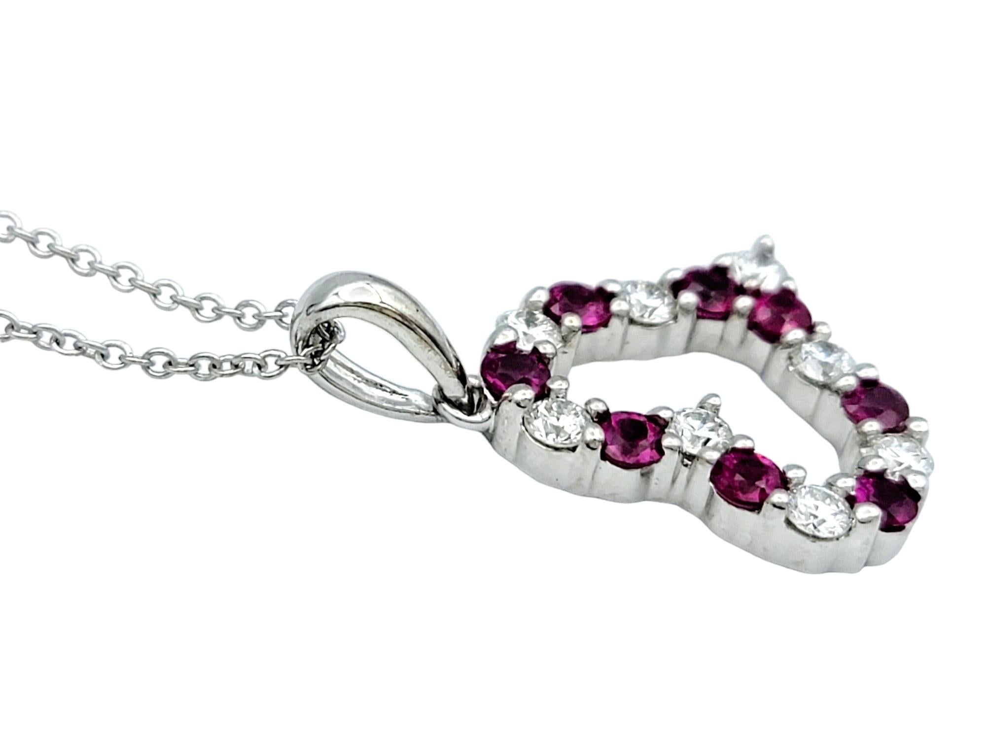Contemporary Round Diamond and Ruby Open Heart Pendant Necklace Set in 14 Karat White Gold For Sale