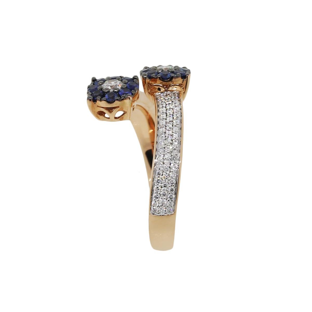Material: 18k Rose gold
Diamond Details: Approximately 0.52ctw of round brilliant diamonds. Diamonds are I/J in color and VS2-SI1 in clarity
Sapphire Details: Approximately 0.43ctw of round Sapphires.
Ring Size: 7
Ring Measurements: 0.75″ x 0.50″ x
