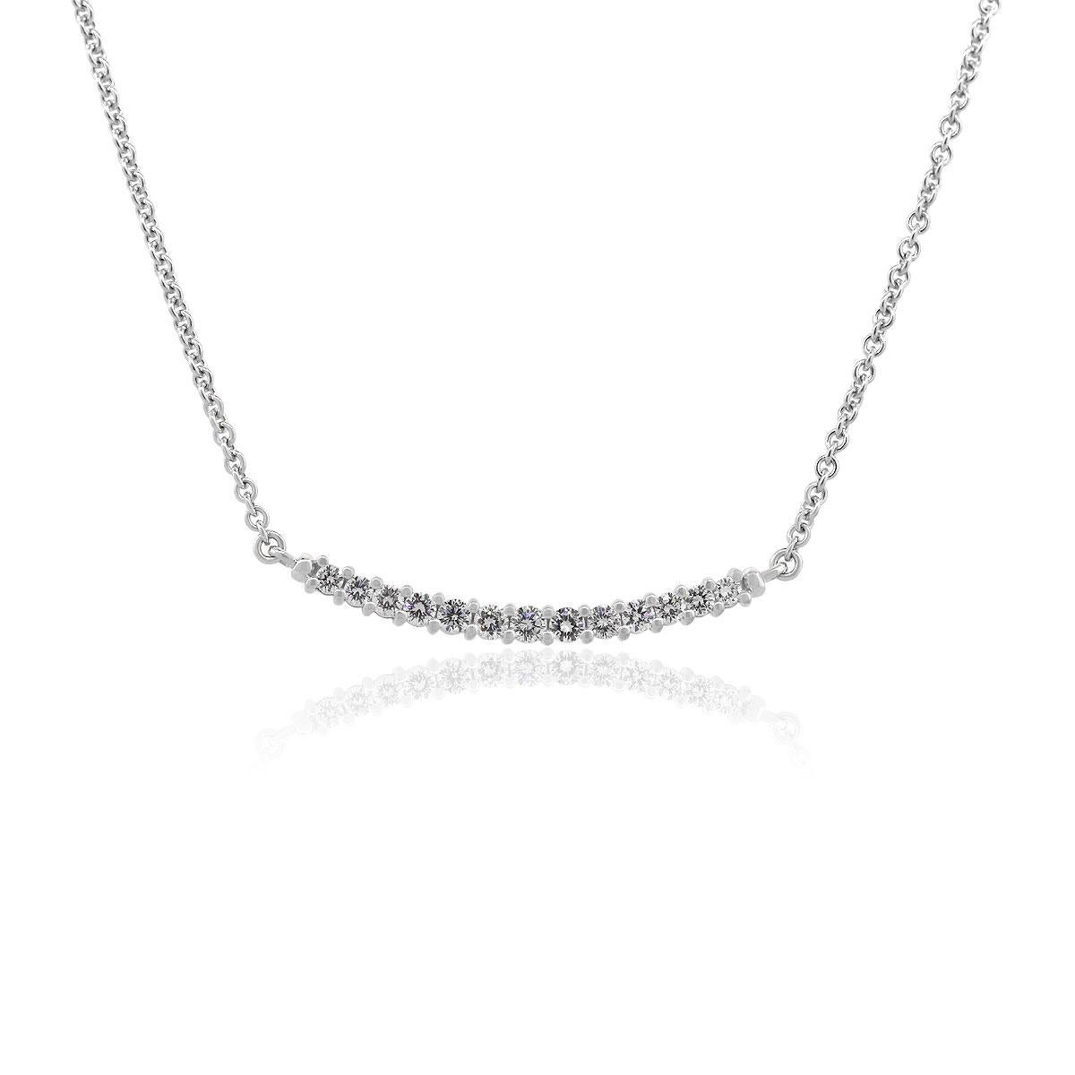 Material: 18k White Gold
Diamond Details: Approx. 1ctw of round brilliant diamonds. Diamonds are G/H in color and VS in clarity.
Necklace Measurements: 16″ in length
Pendant Measurements: Approx. 1.5″ x 0.13″ x 0.13″
Fastening: Lobster clasp
Item