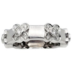 Bezel Set Diamond Flower Motif Eternity Band Ring in Brushed 14 Karat White Gold