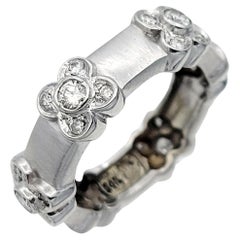 Round Diamond Bezel Flower Station Band Ring in 14 Karat White Gold 