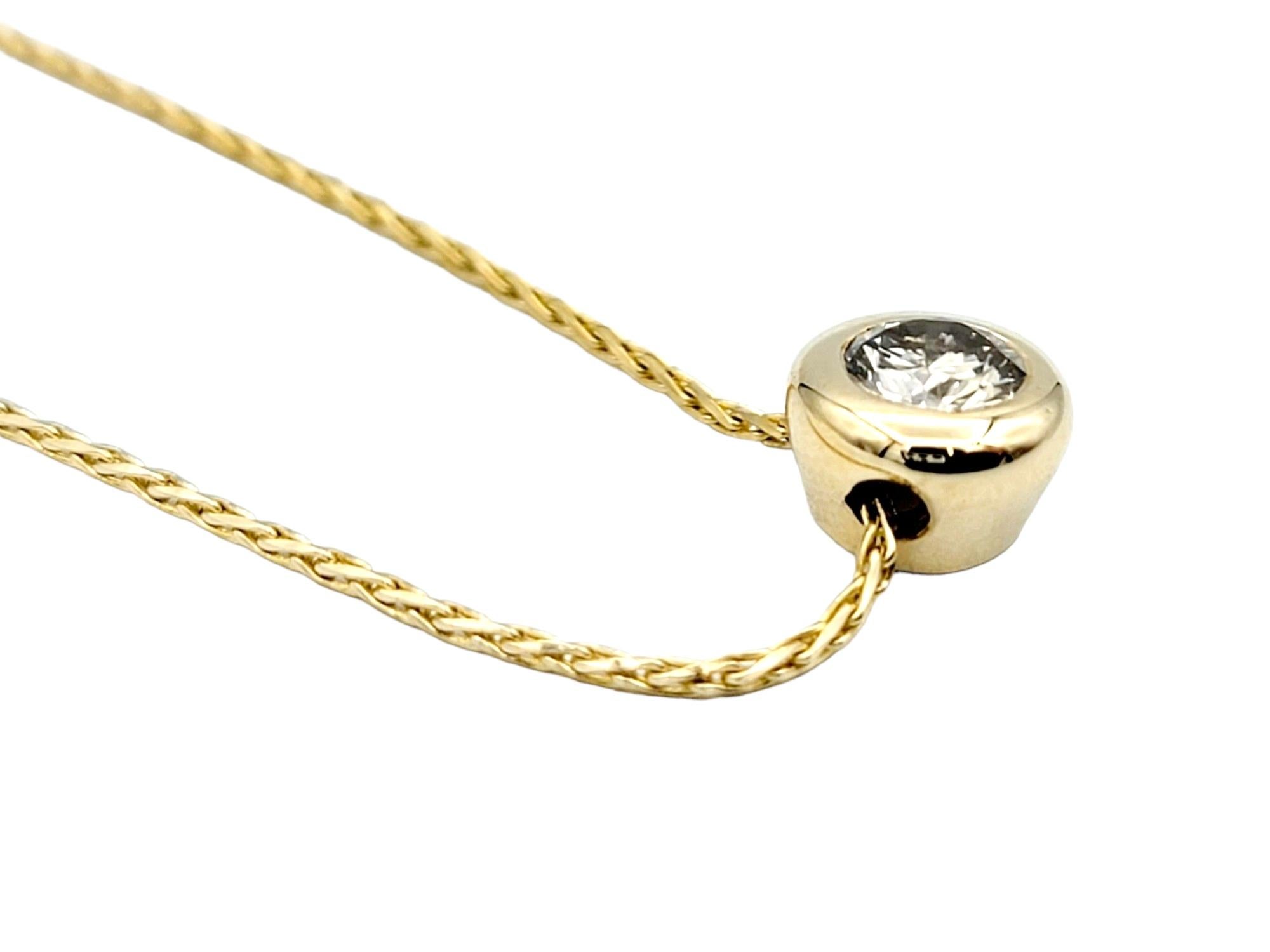 Contemporary Round Diamond Bezel Solitaire Pendant Necklace in 14 Karat Yellow Gold 16.25