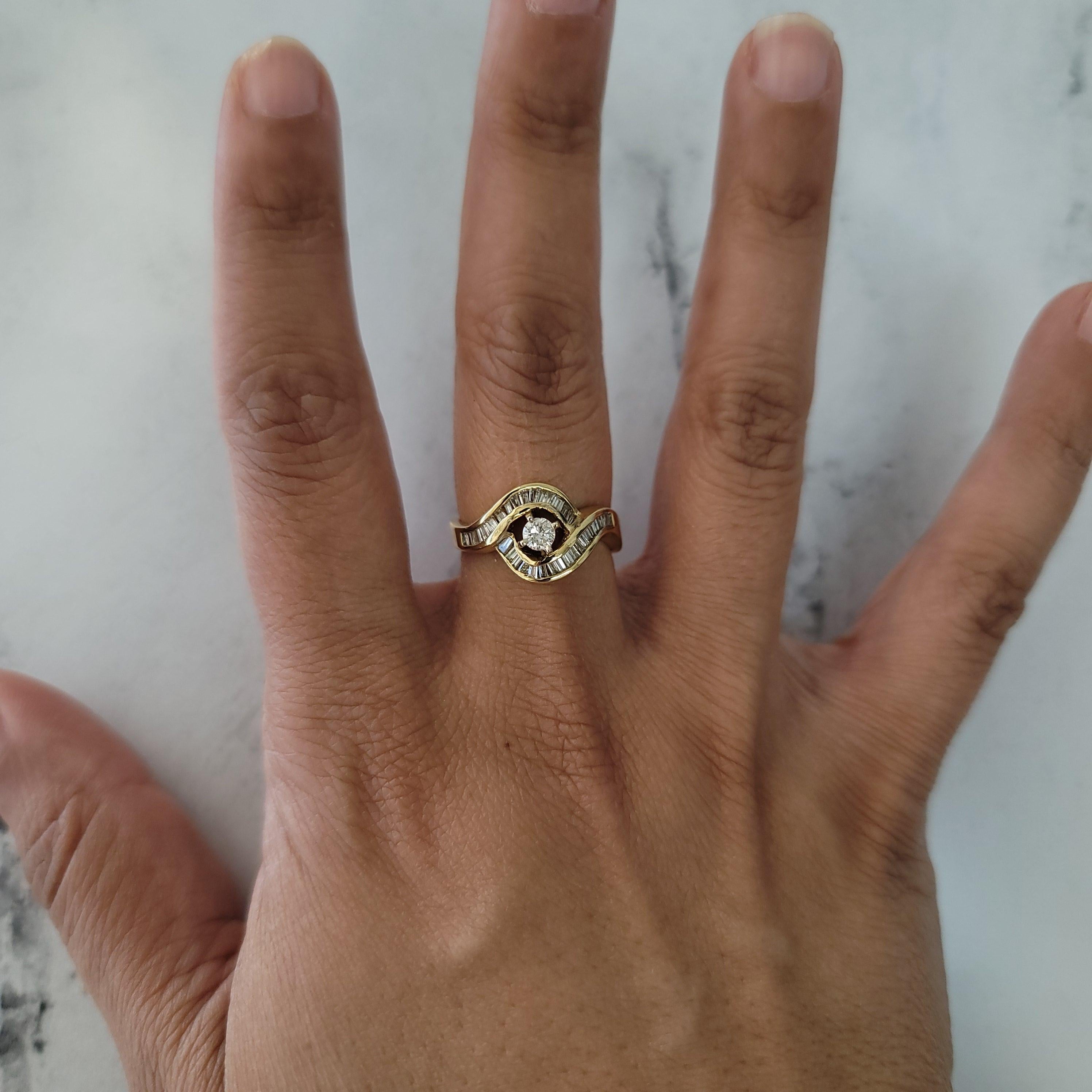 ♥ Ring Summary  ♥

Main Stone: Diamond
Approx. Carat Weight: .92cttw
Diamond Clarity: SI1/SI2
Diamond Color: H/I
Band Material: 14k Yellow Gold
Stone Cut: Round & Baguette
Width: 11MM
Size: 7.5

Diamonds and gemstones are not simulated or