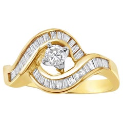 Round Diamond Center with Baguette Accented Engagement Ring