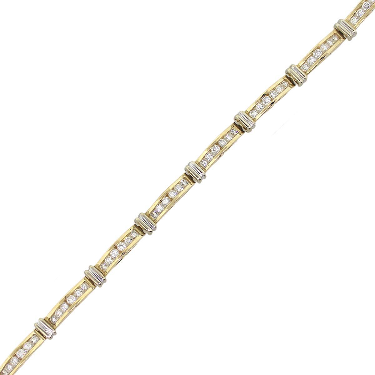 Material: 14k Yellow Gold and white gold
Diamond Details: Approx. 3.00ctw of round brilliant channel set diamonds. Diamonds are G/H in color and SI in clarity
Clasp: Tongue in box with safety latch
Measurement: It will fit up to a 7″ wrist
Total
