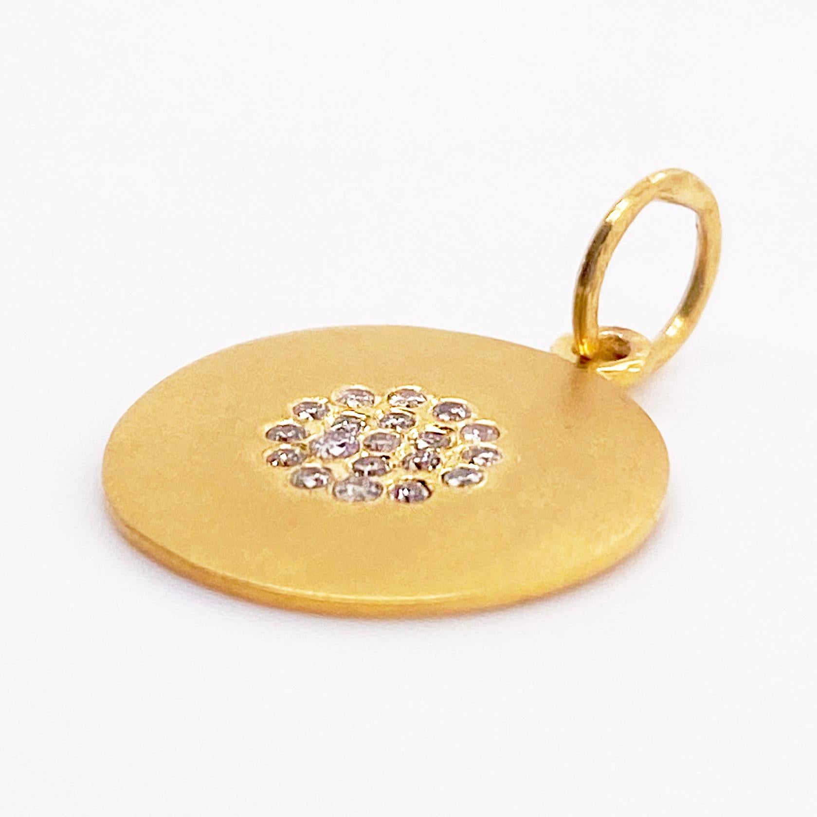 The details for this gorgeous charm are listed below:
Metal Quality: 14K Yellow Gold
Charm Type: Diamond Disc
Charm Measurements: 15 millimeters
Diamond Number: 19
Diamond Shape: Round Brilliant
Diamond Clarity: VS2 (excellent, eye clean)
Diamond