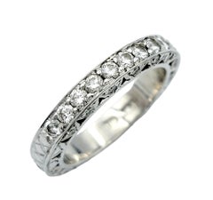 Round Diamond Eternity Band Ring with Side Cutouts in 19 Karat White Gold