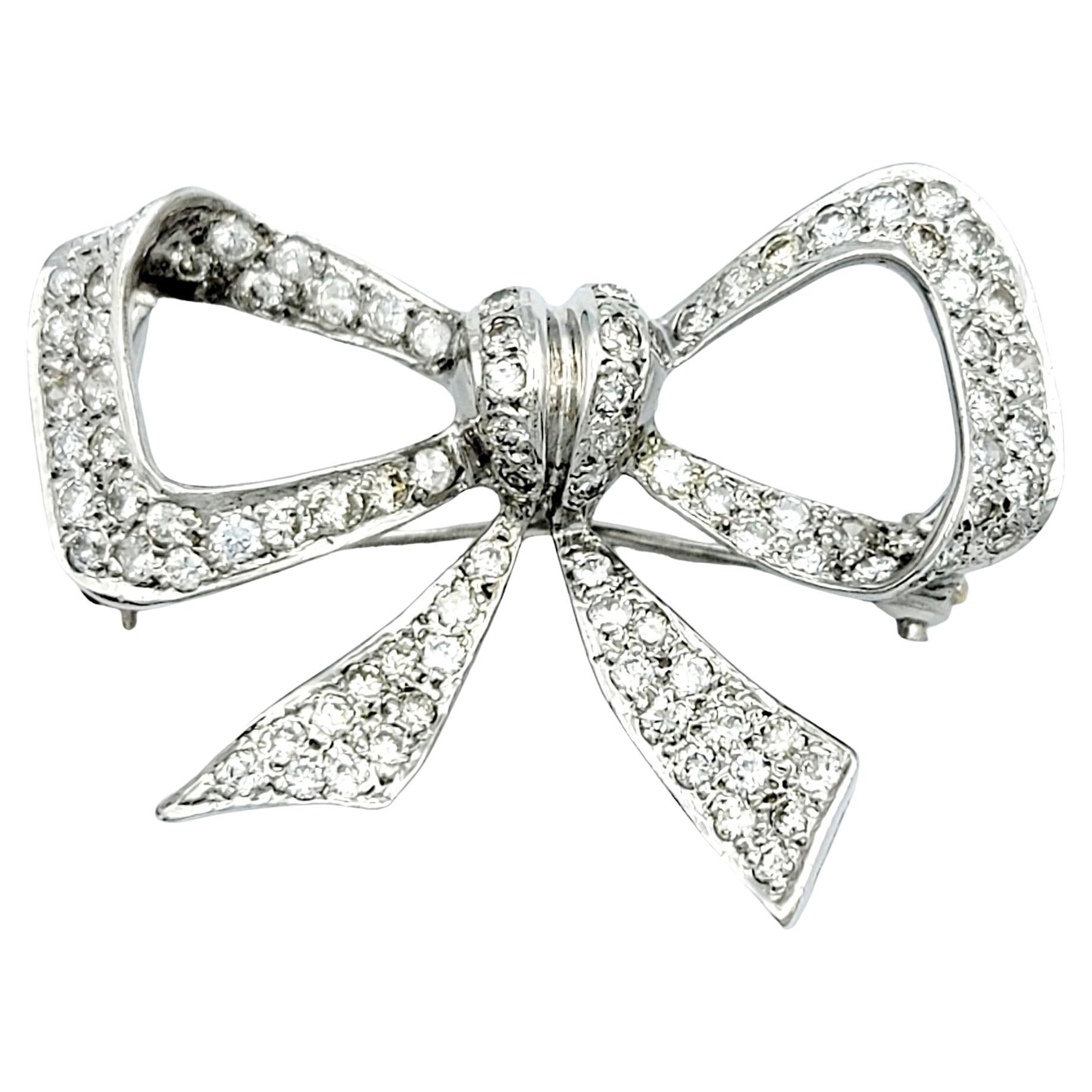 Round Diamond Encrusted Ribbon Bow Brooch / Pendant in 14 Karat White Gold For Sale