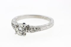 Round Diamond Engagement Ring, Channel Set Side Diamonds and Engraving 'Certed'