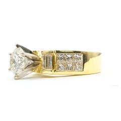 Anillo de compromiso con diamante redondo en oro amarillo de 18k