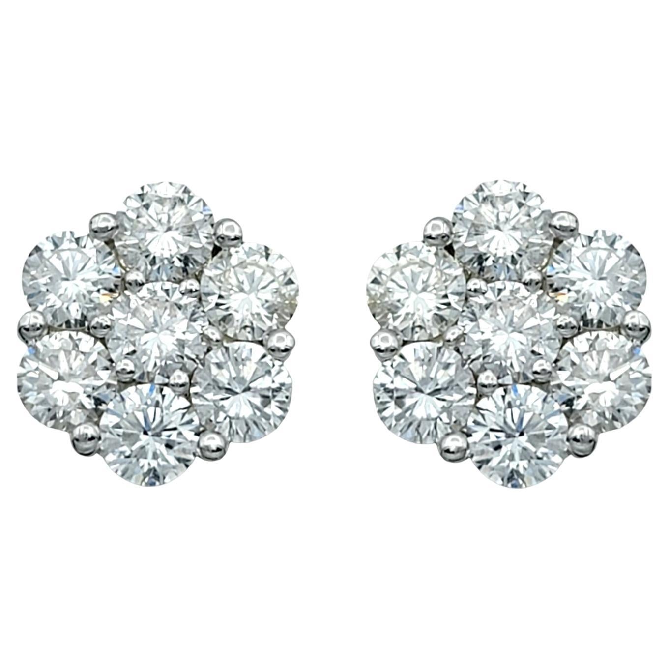 Round Diamond Floral Motif Cluster Stud Earrings in Polished 19 Karat White Gold For Sale