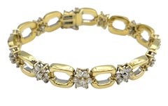 Round Diamond Flower Motif Link Bracelet in Polished 18 Karat Yellow Gold