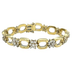 Bracelet à maillons en or jaune 18 carats avec motifs de fleurs en diamants ronds