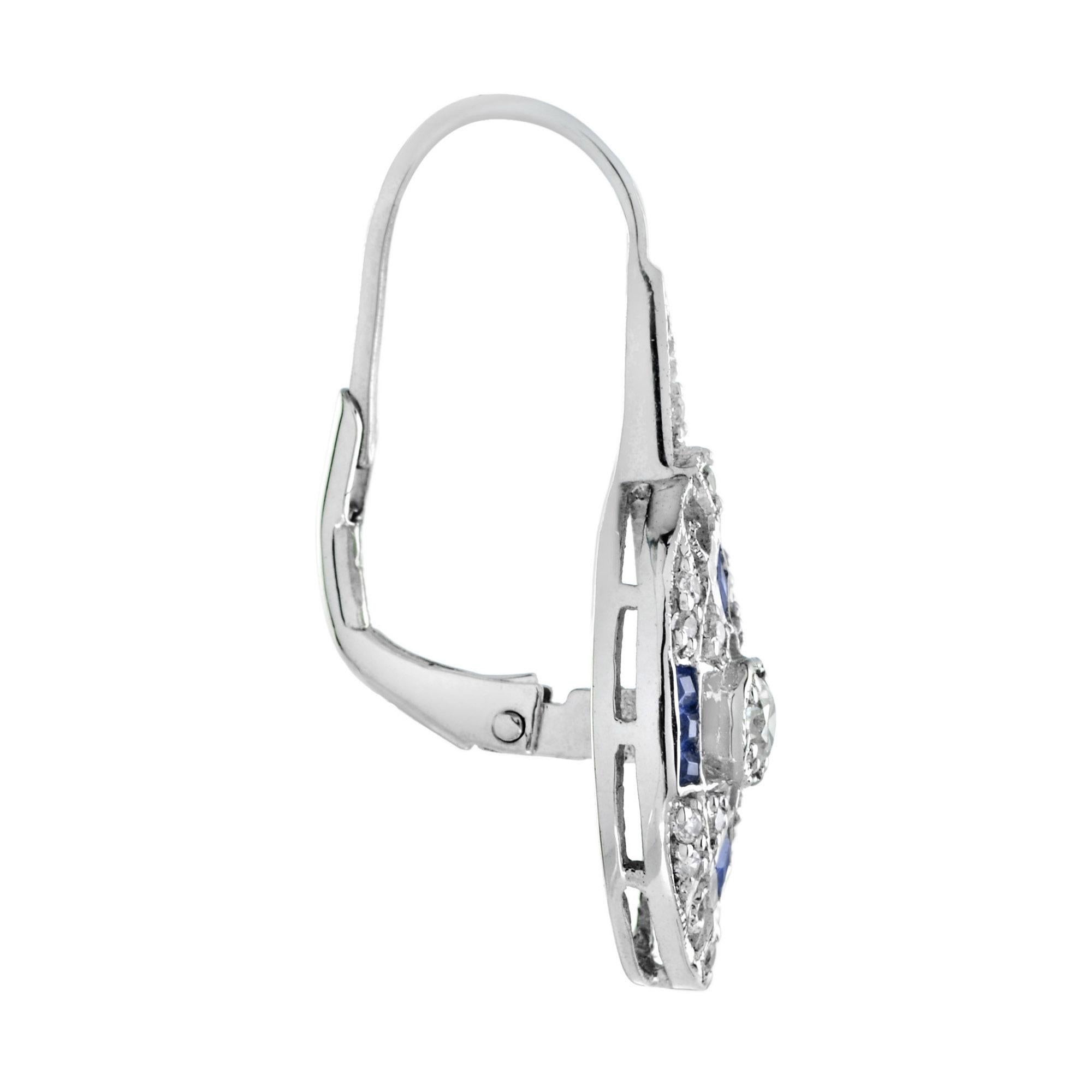 A pair of Art Deco style sapphire and diamond lever back earrings, set with French cut sapphires and round cut diamonds. 14K White Gold.
Information
Width: 8 mm.
Length: 25 mm.
Weight: 3.80 g. (approx. total weight)
Backing: Lever Back
Center