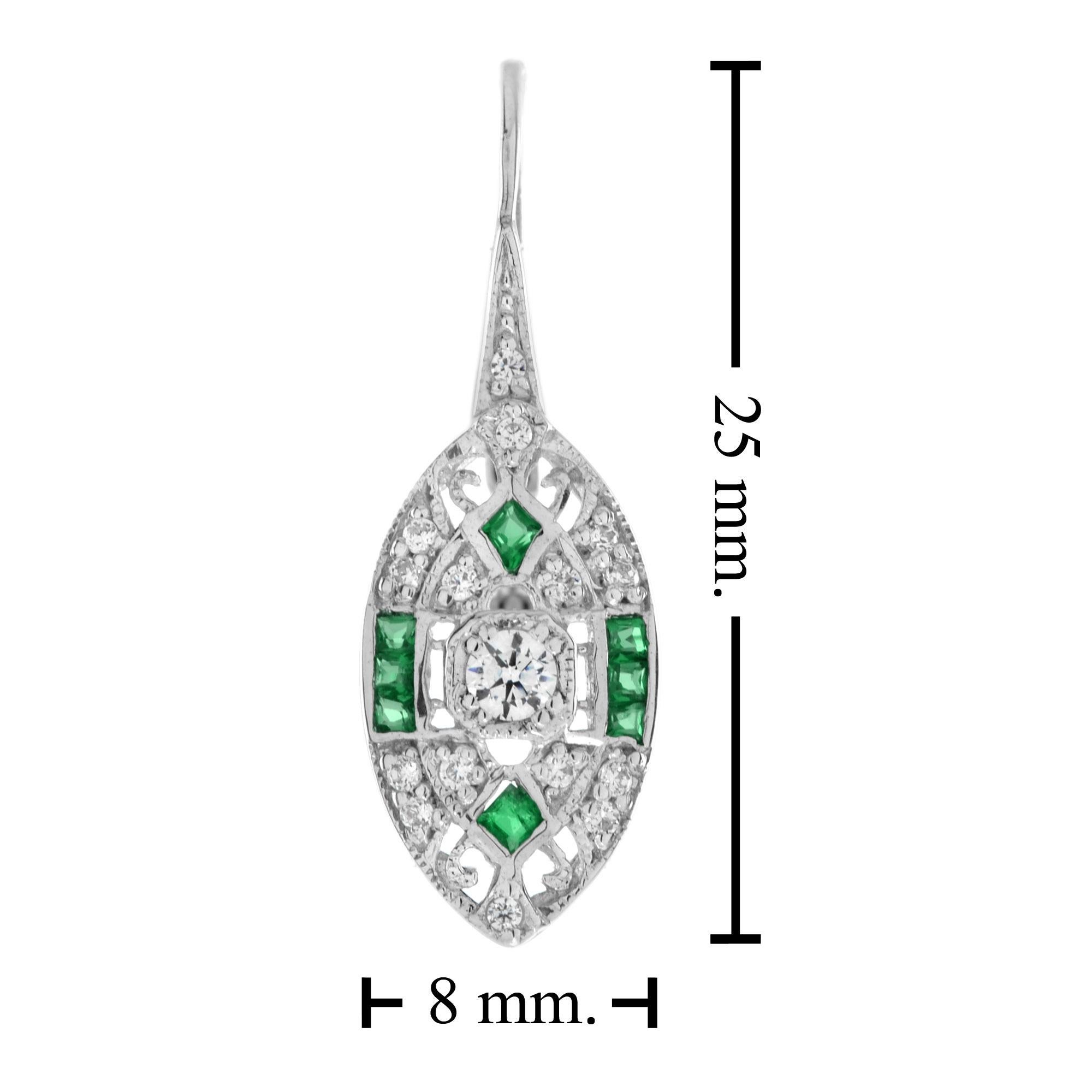 A pair of Art Deco style emerald and diamond lever back earrings, set with French cut emeralds and round cut diamonds. 14K White Gold. 
Information
Style: Art Deco
Width: 8 mm.
Length: 25 mm.
Weight: 3.80 g. (approx. total weight)
Backing: Lever