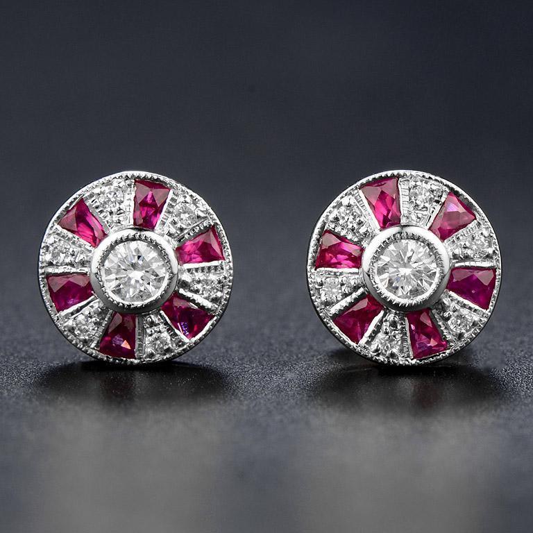 Created in adorned with French cut ruby and round diamonds the design is reminiscent of a Ferris Wheel, they have a beautiful elegant feel to them and sit comfortably on the ear. These earrings would make a wonderful romantic offering to the special