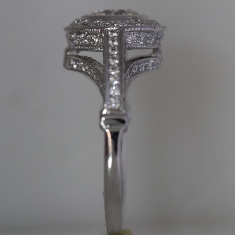 Modern Round Diamond Halo Engagement Ring 1.91 Carat TW Set in Platinum For Sale