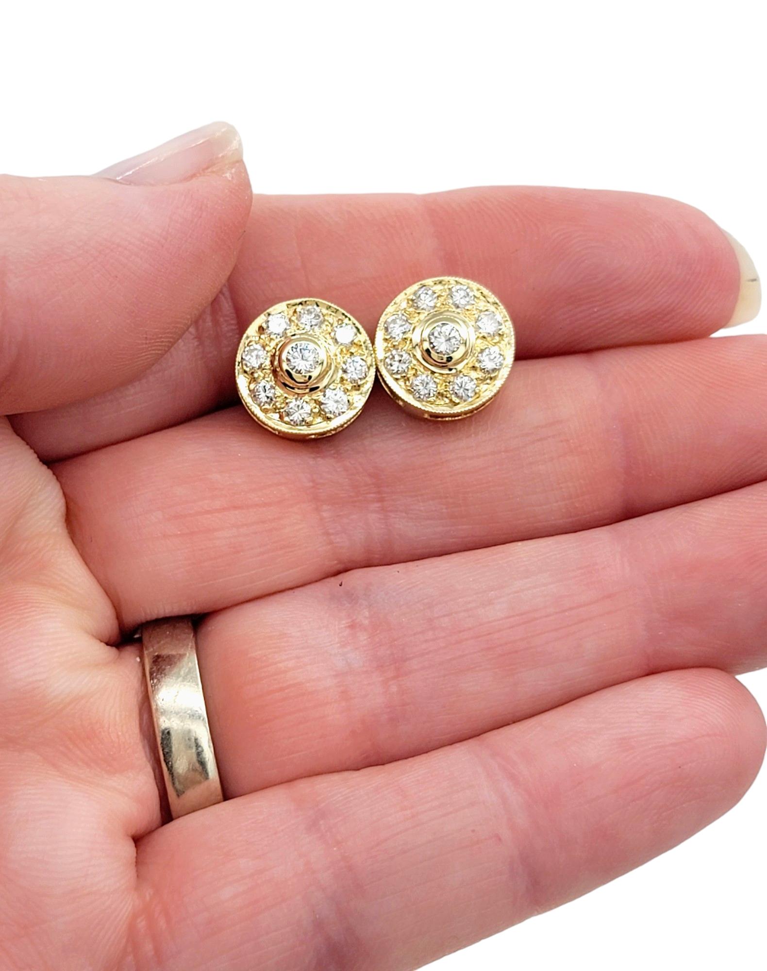 Women's Round Diamond Halo Style Stud Earrings Set in Polished 14 Karat Yellow Gold For Sale