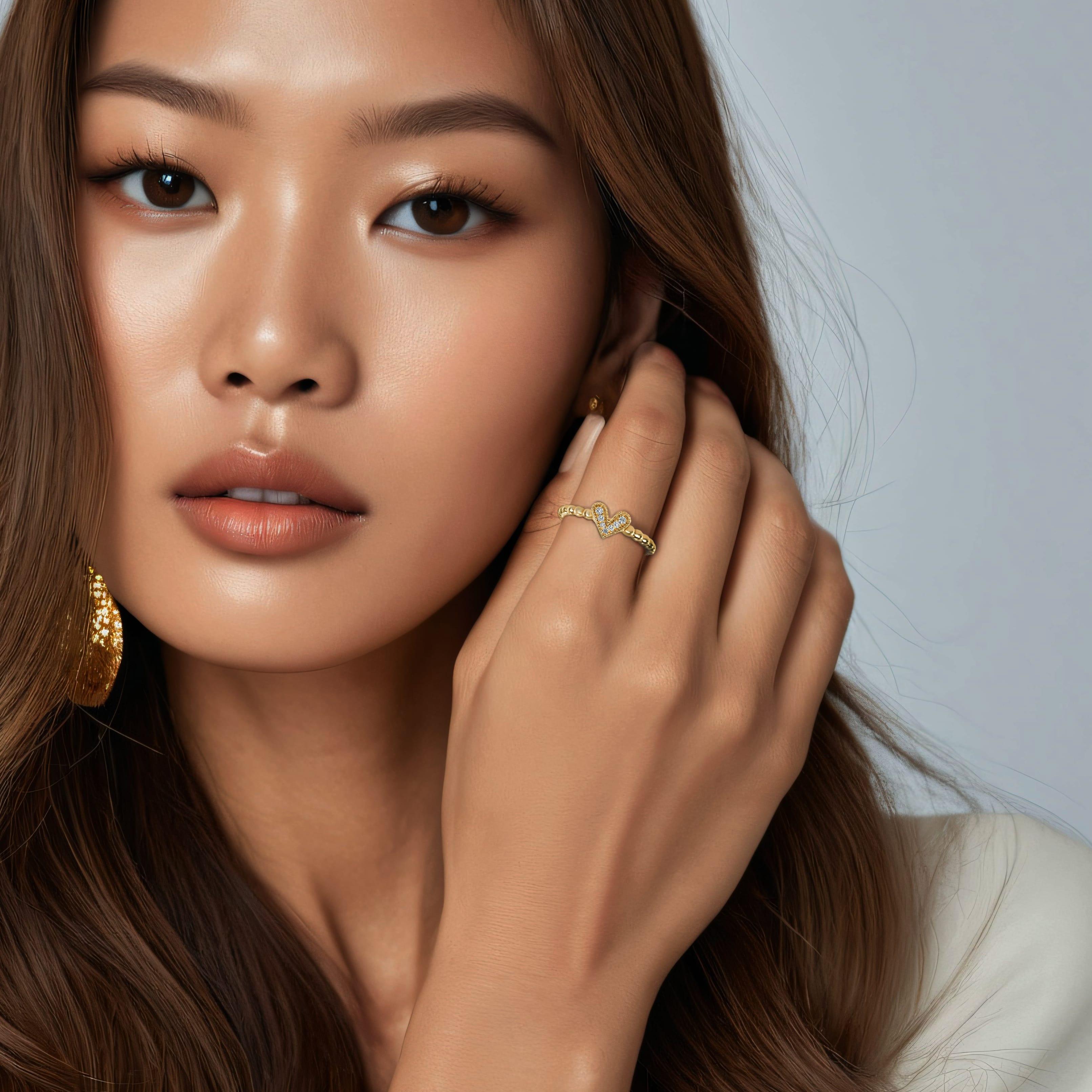 in vendita:  Anello con diamante rotondo e cuore in oro 14K 2