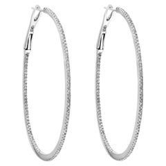 Pendientes de aro de diamante redondo en oro blanco de 18 quilates